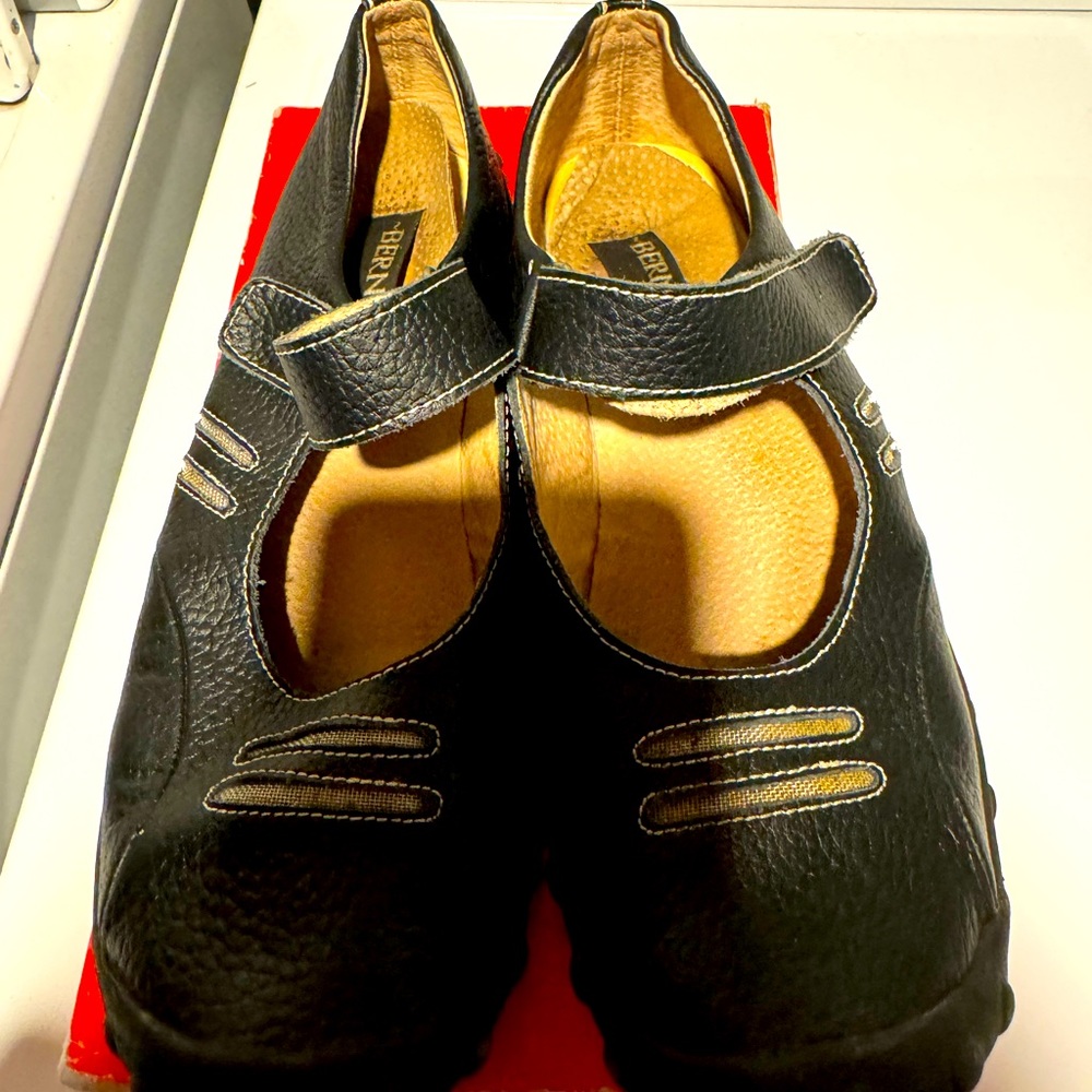 Black gym shoes. Can be worn dressy. Size 9